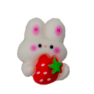 The little rabbit holding  strawberries